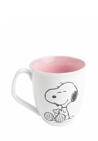 Tazza in ceramica con esterno bianco e interno rosa, caratterizzata da un personaggio dei cartoni animati disegnato con una linea nera che tiene un cuore.