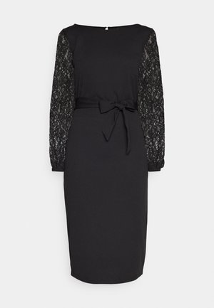 Black dress with lace long sleeves, fitted waist, and a tied belt. Smooth fabric with a sleek, straight-cut silhouette and round neckline.