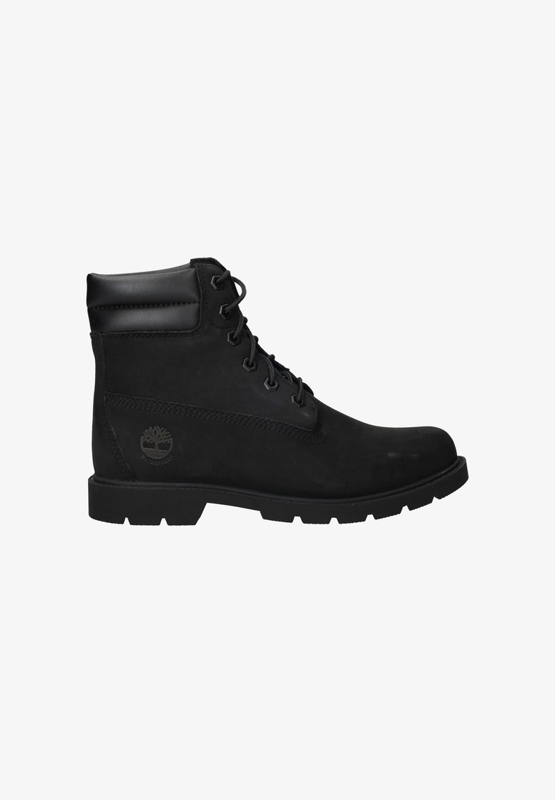 Black leather ankle boot with a smooth finish, round toe, and lace-up front. Features a textured rubber sole and logo detail on the side.