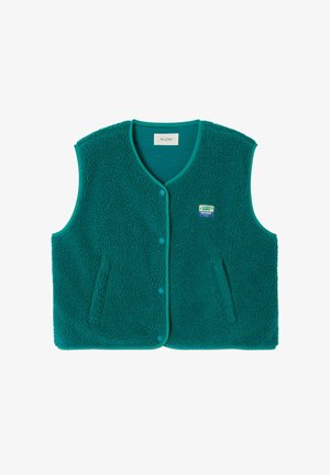 Teal fleece vest with rounded neckline, snap buttons, two front pockets, and a decorative patch on the left side. Textured, soft material.