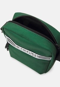 Lacoste NEOCROC SEASONAL UNISEX - Borsa a tracolla - vert/noir/blanc