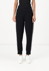 Guess - VICTOIRE PANTS - Tracksuit bottoms - jet black Thumbnail Image 1