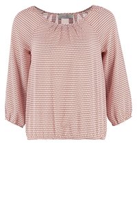 Blouse rose clair avec petit motif géométrique foncé, encolure ronde et manches bouffantes trois-quarts avec poignets élastiques.