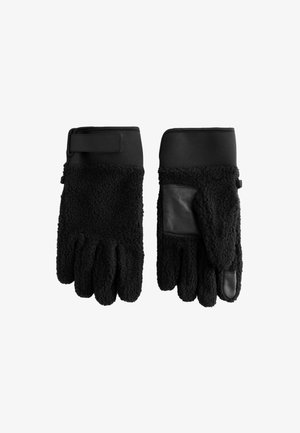 Juodos vilnonės pirštinės su odos pleistrais delnuose ir reguliuojamais riešo dirželiais.