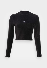 Schwarzes langärmliges Cropped-Top mit Stehkragen, kleinem weißen "cK"-Logo auf der Brust und dezentem Logo am linken Ärmelabschluss.