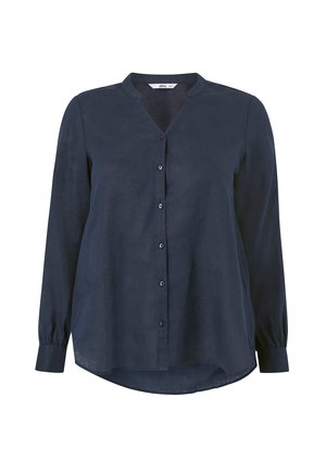Námořnická modrá košile s dlouhým rukávem, která má výstřih do V, zapínání na knoflíky a volný střih s mírně zakřiveným lemem a nařasenými manžetami.