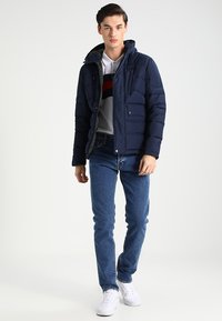 Carhartt WIP KLONDIKE MILLS - Tiesaus kirpimo džinsai - blue stone washed