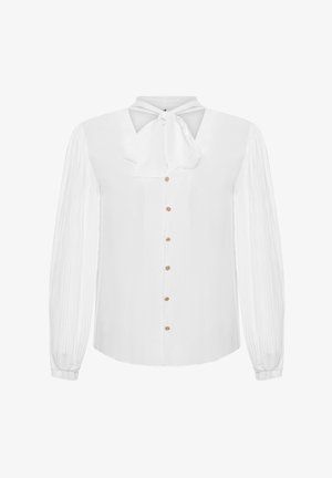 Witte blouse met lange mouwen, een strik hals, knoopsluiting aan de voorkant en gestructureerde mouwen. Bevat gouden knoopaccenten langs de knoopsluiting.