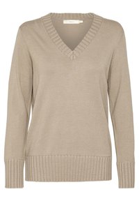 Beige stickad tröja med V-ringning, ribbat krage och mudd. Har en mjuk yta och en avslappnad passform. Tillverkad av akrylblandning.