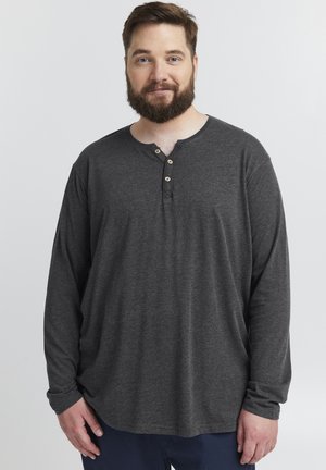 Long-sleeve, dark gray henley shirt made from soft fabric, featuring a round neckline and three wooden buttons on the placket.