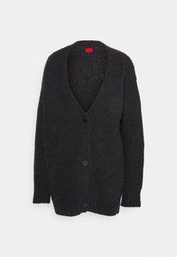 Sort cardigan med v-hals, lange ærmer og tekstureret strikmateriale. Har to sorte knapper og en løs, afslappet pasform.