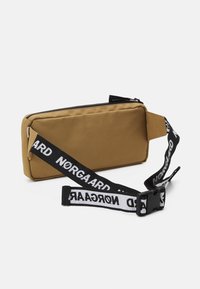 Mads Nørgaard BEL ONE CARNI UNISEX - Övtáska - tiger's eye