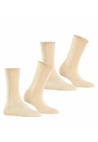 Beige katoenen sokkenmix, met een gladde textuur, ribbelboorden, middellange lengte tot de kuit, en versterkte teen en hiel voor duurzaamheid.