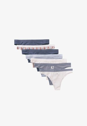 Zeven dames bikinislips in verschillende tinten blauw, wit en gestreepte patronen, in een verspringende rij gelegd.