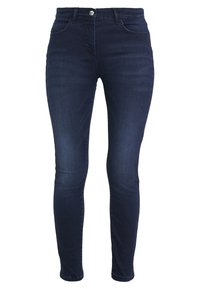 Jeans ajustados de un azul oscuro con una textura suave, cinco bolsillos y cierre de botón. Presentan un ligero desvanecimiento a lo largo de las piernas.