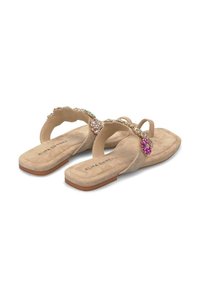 Beige suede flip-flops with embellishments, featuring a flat sole and decorative jeweled accents in pink and green on the straps.