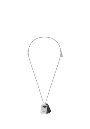 Silver chain necklace with two dog tag pendants, one engraved with a Batman logo and the other textured black.
