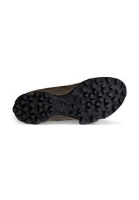 Outdoor shoe sole in dark rubber featuring a rugged, multi-directional tread pattern for improved grip and traction. Brown upper material visible.