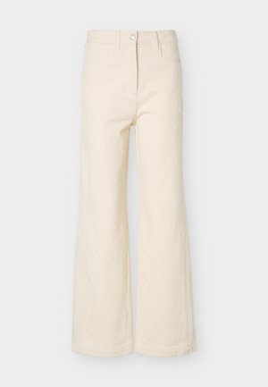 Υψηλοκάβαλα κρεμ παντελόνια με φαρδιά μπατζάκια, με κουμπί στο μπροστινό μέρος, κλείσιμο με φερμουάρ, θηλιές για ζώνη και διακριτική υφασμάτινη υφή.