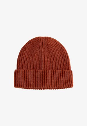 Robota z dzianiny w kolorze wypalanej pomarańczy, z prążkowaną fakturą i podwiniętym mankietem. Wykonana z miękkiego materiału dla zapewnienia ciepła i komfortu.