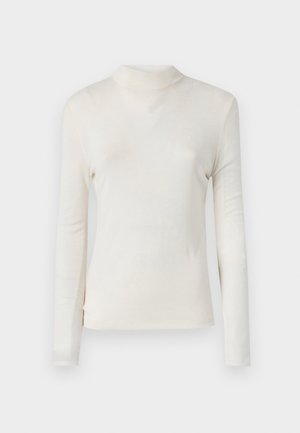 Top a maniche lunghe con colletto alto di colore crema chiaro, realizzato in un tessuto morbido e liscio, con un design aderente e senza motivi o decorazioni visibili.