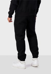Black Bananas JOGGING ARCH - Träningsbyxor - black