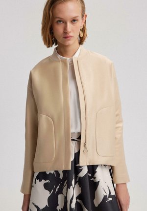WITH POCKET DETAIL
 - Giacca da mezza stagione - beige