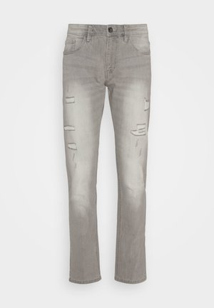 Graue Jeans aus Denim mit geradem Schnitt, ausgestattet mit distressed Akzenten und Rissdetails an der Vorderseite. Abgerundet mit Standard-Taschen und einem Knopfverschluss.