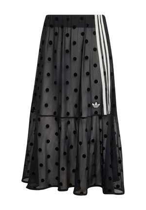 Black sheer midi skirt with velvet polka dots, white side stripes, elastic waistband, and small Adidas logo near hem.