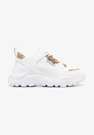 White chunky sole sneaker with gold glitter accents and a "Versace Jeans Couture" logo on the side panel and laces.