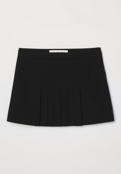Black pleated skirt with a smooth waistband. Made from a lightweight fabric, featuring vertical pleats that add texture and detail.