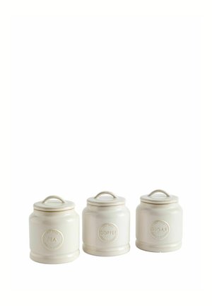 Three white ceramic canisters with lids labeled tea, coffee, and sugar arranged in a row on a white background.