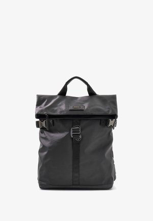 Roll-top black nylon backpack with a textured finish, adjustable straps, a buckle closure, and a reinforced handle on top.