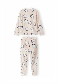 Conjunto de camiseta de manga larga y pantalones en color rosa claro con patrones de corazones blancos contorneados en negro, con cintura elástica en los pantalones, mostrado plano sobre un fondo blanco.
