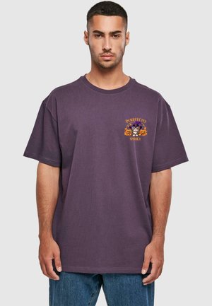 Purple cotton t-shirt with short sleeves, featuring a graphic print of a cat in a hat with pumpkins and the text "PURRfectly SPOOKY."
