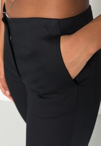 ARKET Chinos - black