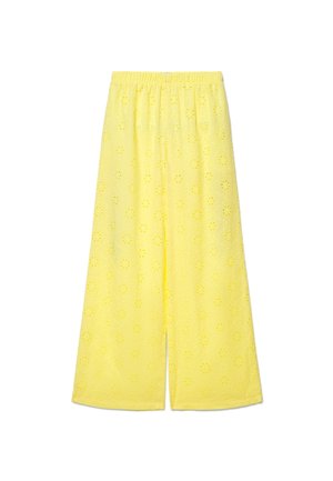 Yellow wide-leg pants with elastic waistband and eyelet floral cutout pattern throughout the fabric.
