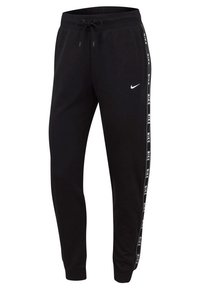 Svarta sweatpants i mjukt tyg, med passande mudd, snörning i midjan och vit Nike-logotyp med varumärkesrand på sidan.