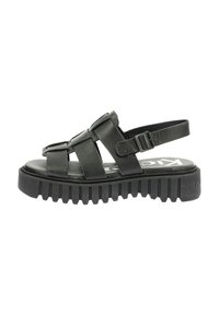 Sandales en cuir noir avec un design à plusieurs lanières, boucle ajustable et semelle en caoutchouc texturée pour une meilleure adhérence. Profil plat, style ouvert à l'avant.