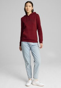 Puma Jersey con capucha - intense red