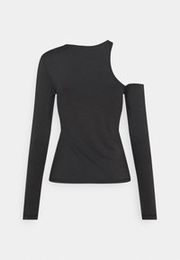 Top nero a maniche lunghe con un taglio su una sola spalla. Realizzato in tessuto liscio, design aderente e scollo rotondo, con orlo uniforme.