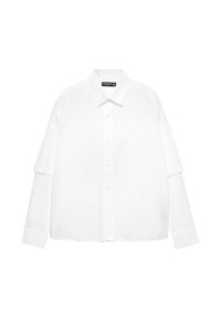 Camicia bianca a maniche lunghe in cotone con abbottonatura frontale, caratterizzata da un colletto classico e maniche oversize con vestibilità rilassata.