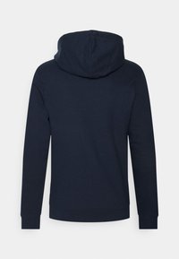Marinblå hoodie med en framficka, dragkedja i huvan och ribbad mudd. Mjukt tyg med en slät textur. Enkelt mönster.