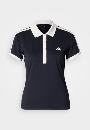 Námořnicky modré polo tričko s bílým límečkem a légu na knoflíky. Má dvě bílé boční pruhy a malé bílé logo na levé straně hrudi.