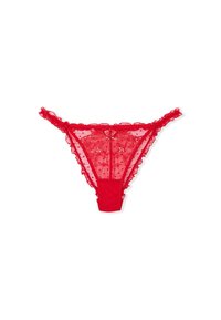 Tanga rojo de encaje con estampado de lunares, que presenta bordes rizados y un lazo decorativo en la parte frontal. Material suave y transparente.