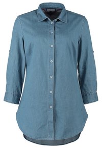 Chemise en denim bleu à manches longues avec fermeture boutonnée devant et col, dotée d’un ourlet légèrement incurvé et de manches avec boutons.
