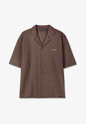 Brown short-sleeved shirt with a relaxed fit, ribbed texture, notch collar, and front button closure. Features a white logo on the chest.