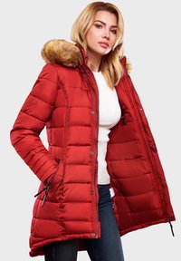 Red puffer jacket with a fur-trimmed hood, quilted design, side pockets, and a zip front. Material appears smooth and insulated.