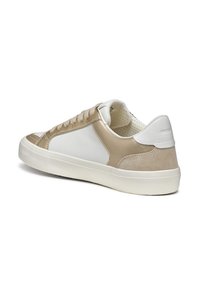 Beige and white sneaker with a smooth leather upper, suede accents, round toe, and rubber sole. Lace-up design with perforated interior.