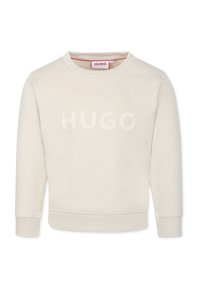 Felpa beige a girocollo con logo "HUGO" testurizzato sul davanti, polsini e orlo a costine, realizzata in un materiale morbido.